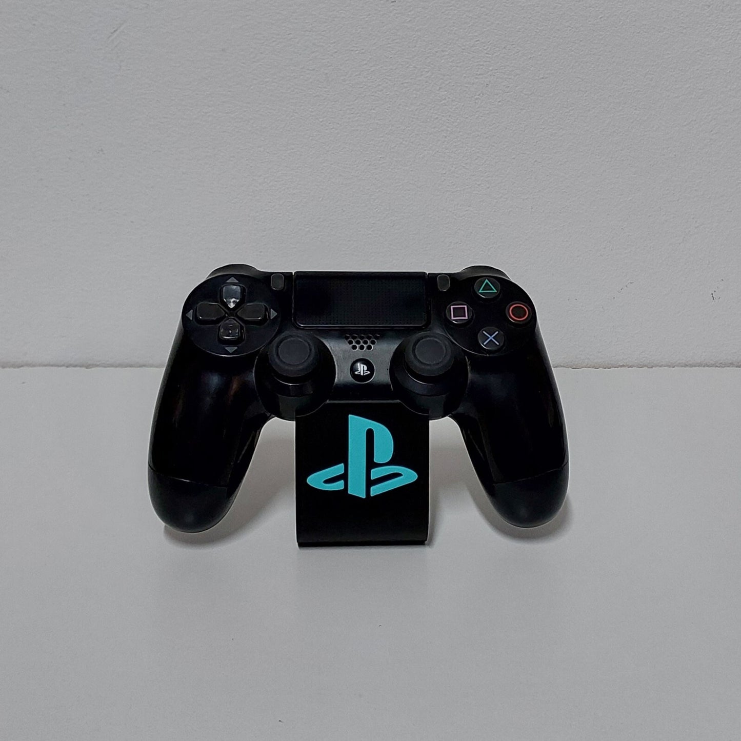 Soporte stand expositor mando Sony PS4. Envíos a todo el mundo