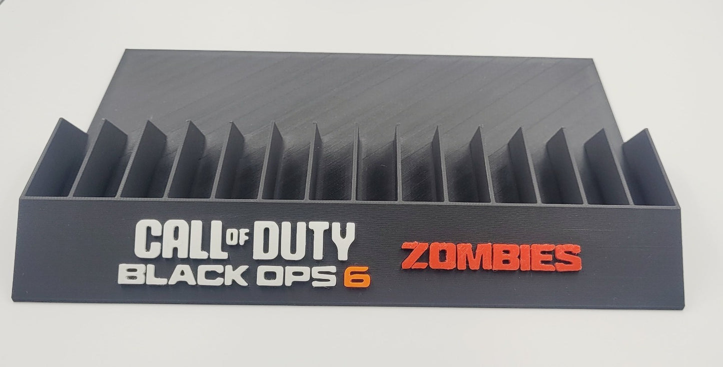 Expositor Call of duty black ops 6 zombie ps2,ps4,ps5 xbox 360 10,12,14,15 Ranuras