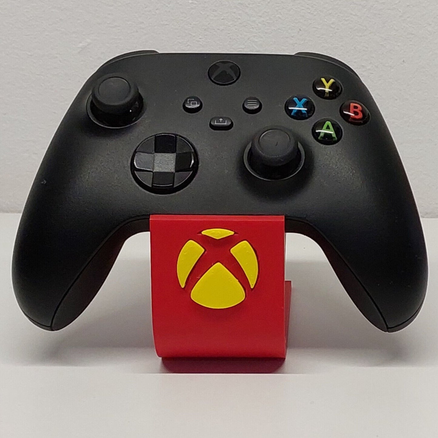 Soporte stand expositor mando Xbox one/series. Envíos a todo el mundo