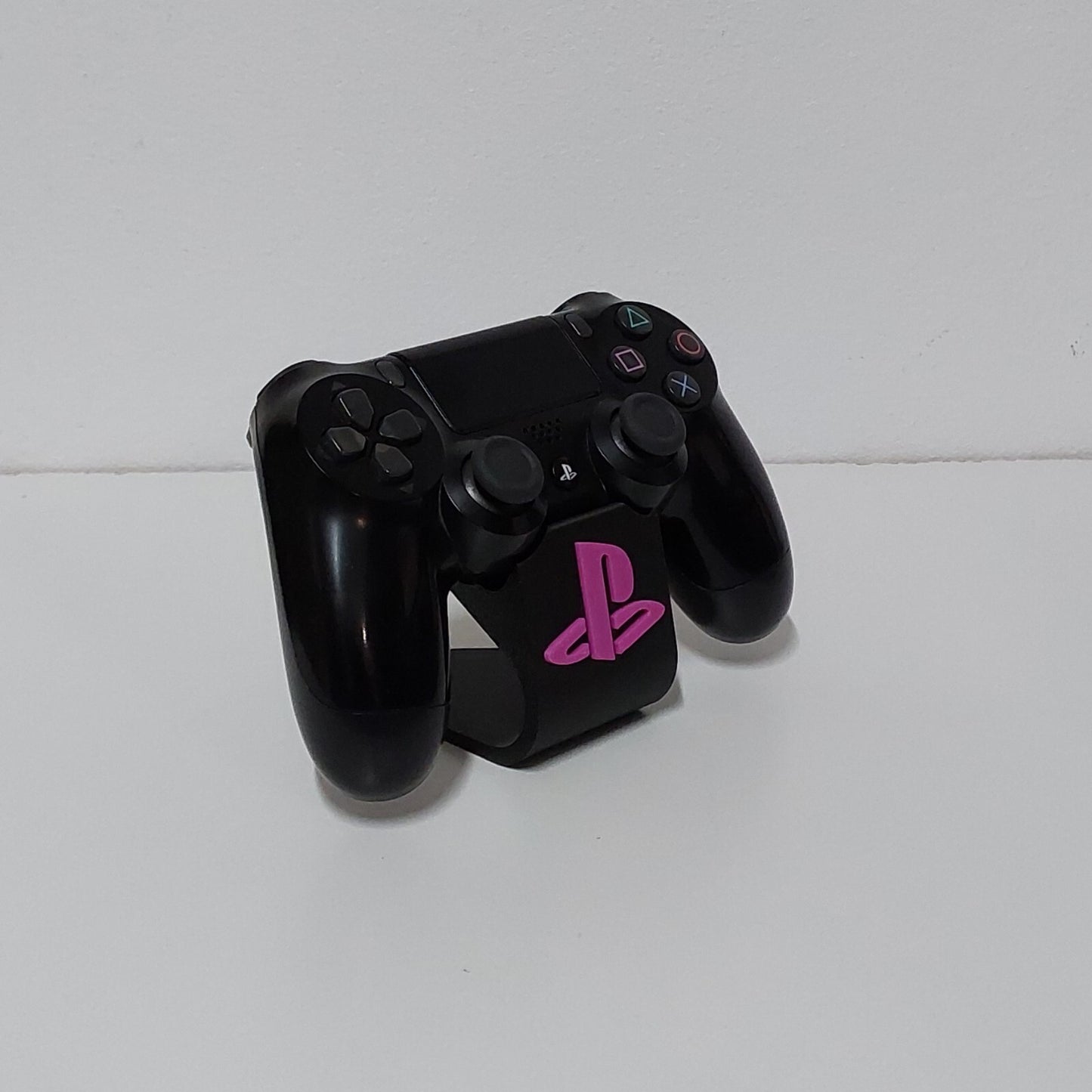 Soporte stand expositor mando Sony PS4. Envíos a todo el mundo