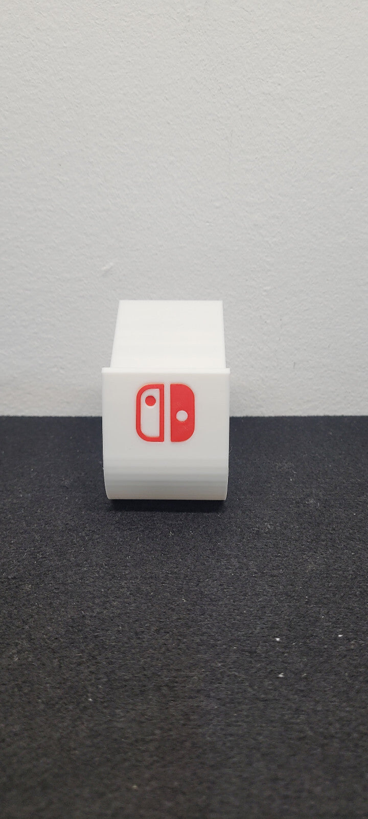 Soporte stand expositor mandos Nintendo Switch Pro hecho en 3D
