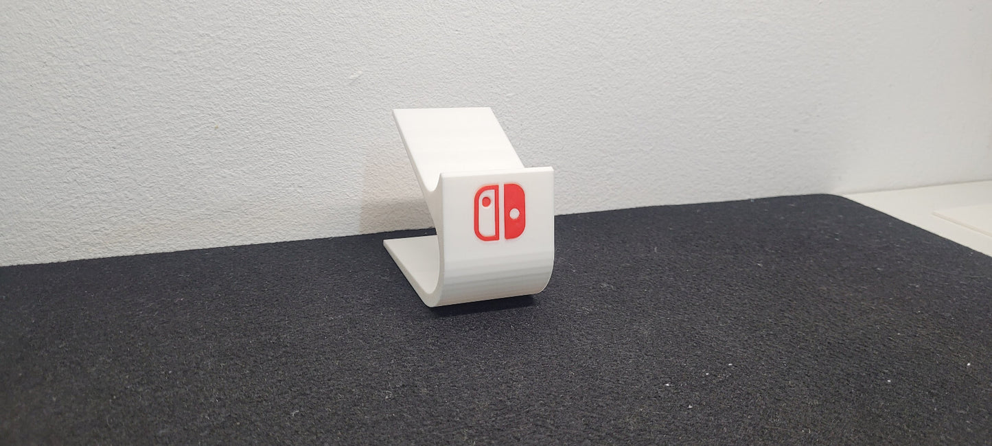 Soporte stand expositor mandos Nintendo Switch Pro hecho en 3D