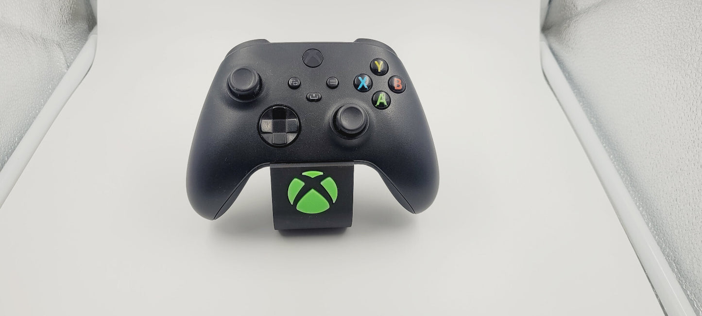 Soporte stand expositor mando Xbox one/series. Envíos a todo el mundo
