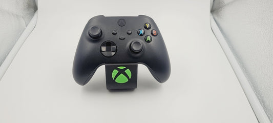 Soporte stand expositor mando Xbox one/series. Envíos a todo el mundo
