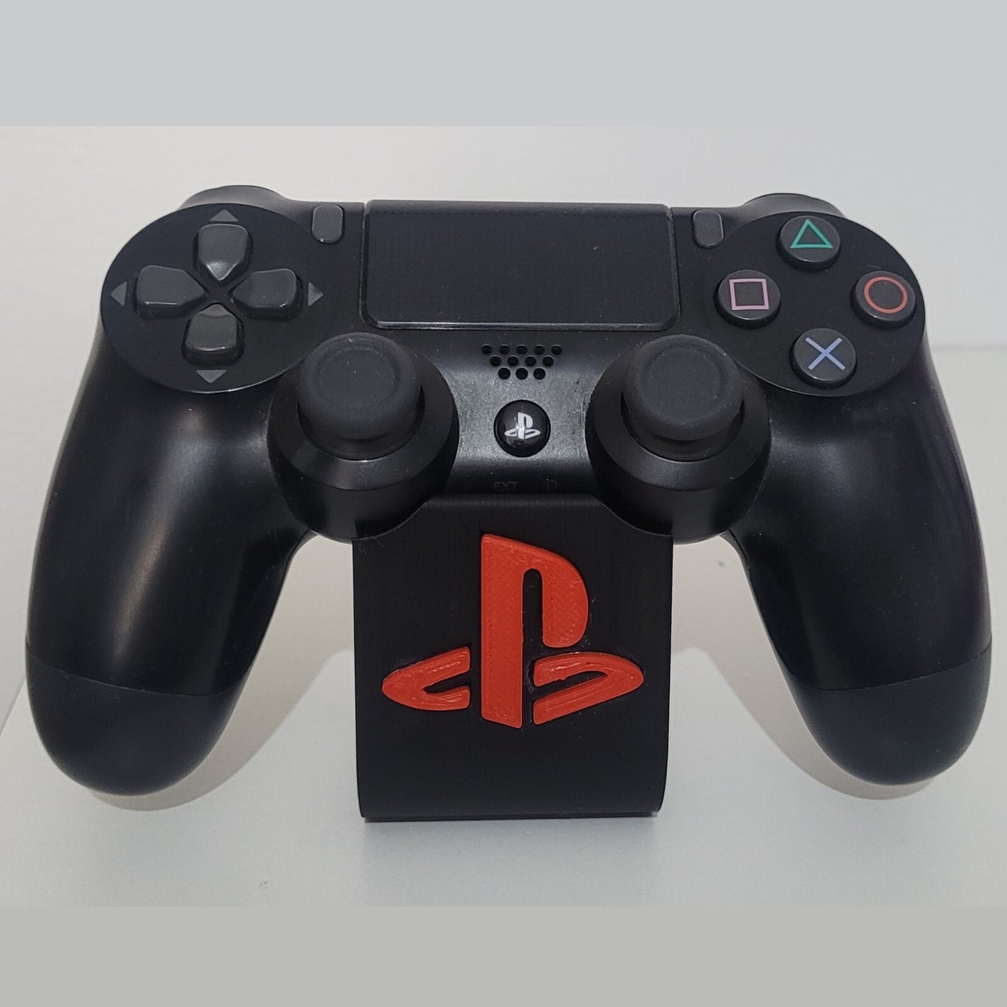 Soporte stand expositor mando Sony PS4. Envíos a todo el mundo