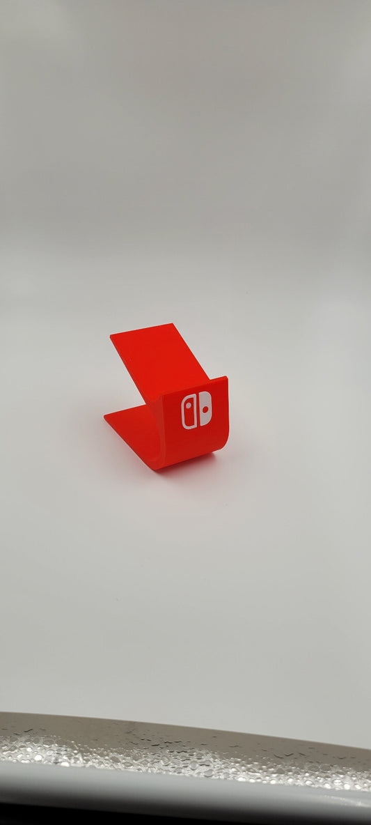 Soporte stand expositor mandos Nintendo Switch Pro hecho en 3D